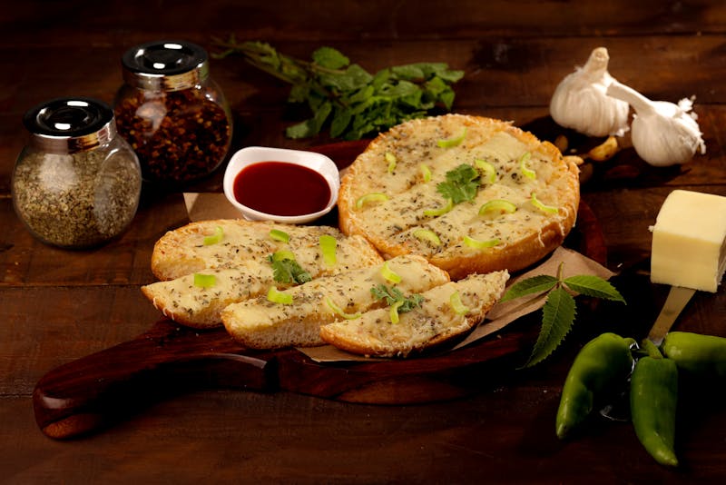 Garlic cheesy bread bites with dipping sauce