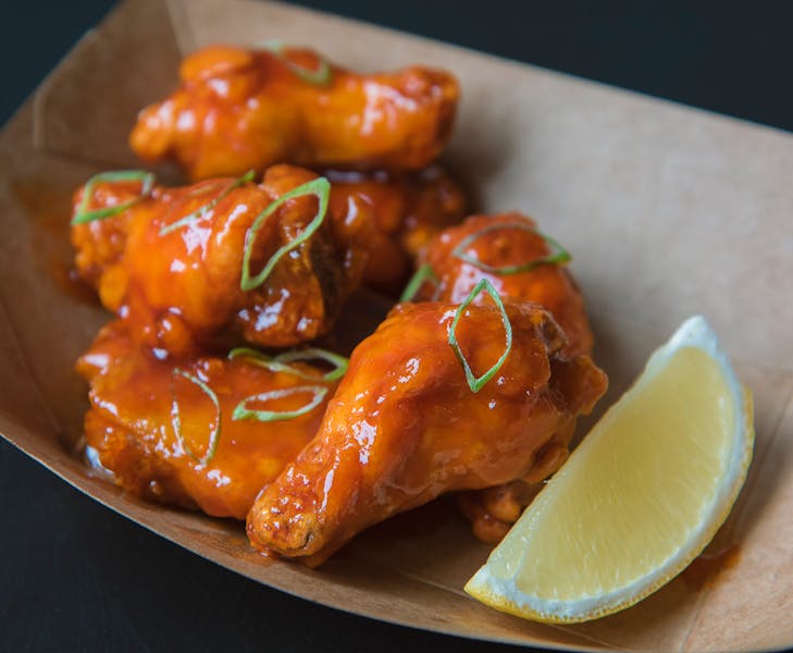 Buffalo wings with celery and blue cheese