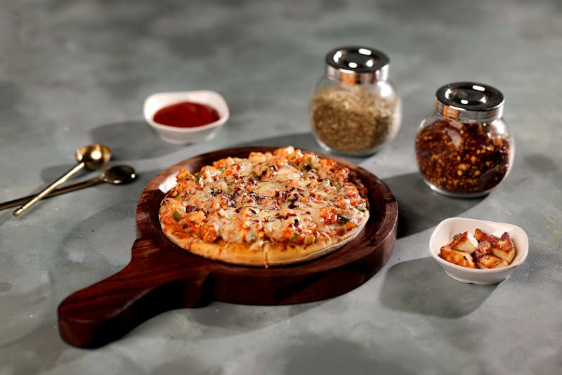 BBQ chicken pizza with caramelized onions